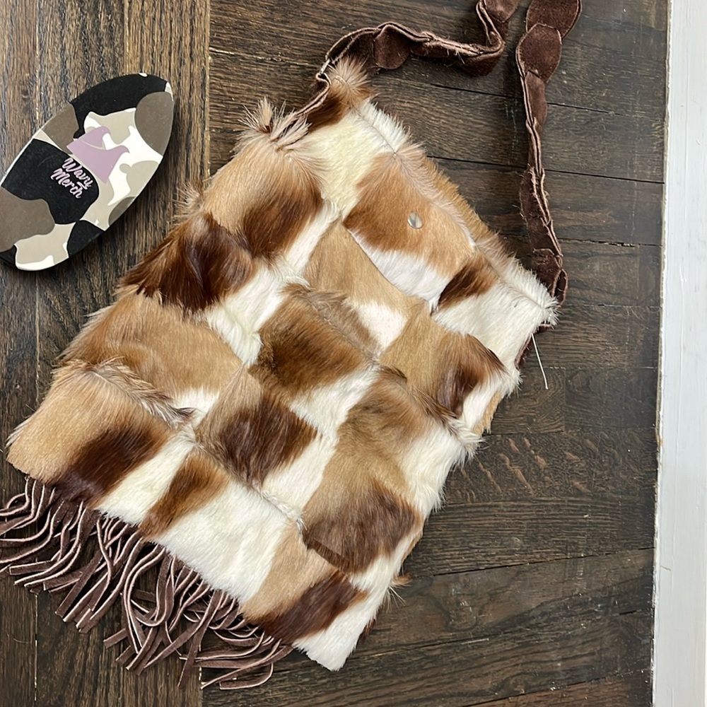 Cowhide fringe crossbody bag and brush
